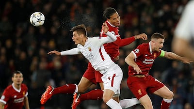 Roma's Patrik Schick in action with Liverpool's Virgil van Dijk and Jordan Henderson. Phil Noble / Reuters