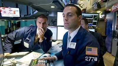 Trying to time the market, hanging on to losing stocks and selling at the wrong time are just some of the common errors investors make. Jin Lee / Bloomberg