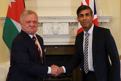 Britain's Prime Minister Rishi Sunak shakes hands with Jordan's King Abdullah II in Downing Street on Sunday. AFP