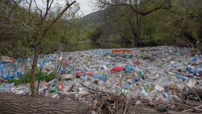 Plastic bottles and other rubbish choke the Morava river in the village of Pogragje near the town of Gjilan, Kosovo. AFP