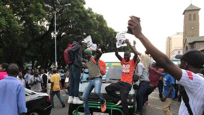 Zimbabweans celebrate in Harare after the resignation of president Robert Mugabe. Ben Curtis / AP Photo