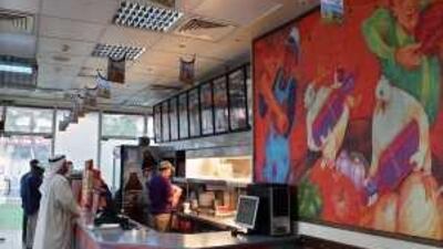 Customers line up at Popeye's, a fast food outlets. Experts say franchising is likely to expand this year as people seek alternative forms of income.