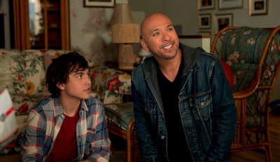 Brandon Wardell, left, and Jo Koy play son and father in 'Easter Sunday'. AP
