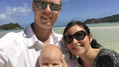 Amanda Tomlinson with her husband Shane and Baby T at the Seychelles. Courtesy Amanda Tomlinson