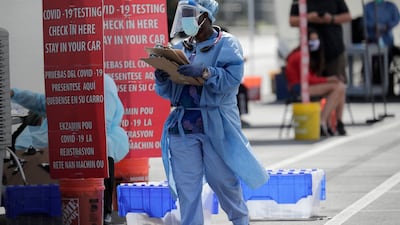 A health care worker at a Covid-19 testing site in Florida. AP