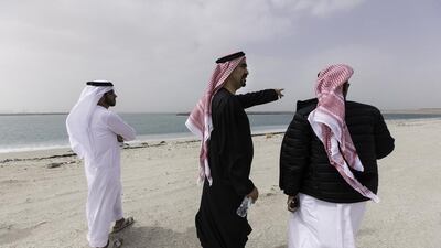 Deira Islands will add a further 40km of coastline, 21km of which will be beaches, to Dubai’s waterfront. Above, Nakheel chairman Ali Rashid Lootah, centre, tours the Deira Islands project. Christopher Pike / The National