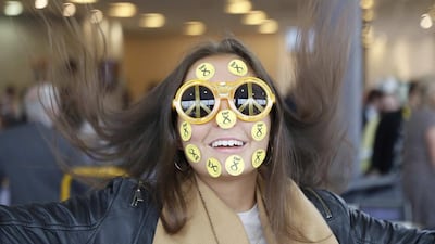 A young woman wears SNP stickers on her face at the Scottish National Party’s conference in Aberdeen, Scotland on March 17, 2017. Russell Cheyne / Reuters