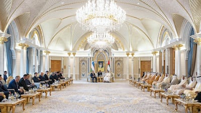 Sheikh Mohamed bin Zayed meets with Mr Mirziyoyev during a reception on Monday.