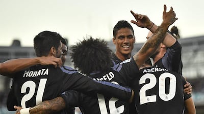 Real Madrid's Asensio, right, celebrates his goal, the team's second of the night. (Alvaro Barrientos/AP)