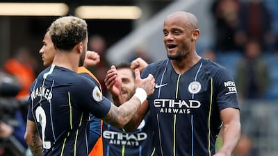 Manchester City's Kyle Walker and Vincent Kompany celebrate after the match. Reuters