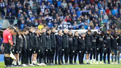 Cardiff City v Leicester City - Cardiff City Stadium, Cardiff, Britain - Leicester City players and staff during a minutes silence as part of remembrance commemorations and for Vichai Srivaddhanaprabha, late chairman of Leicester City Football Club, before the match. Reuters