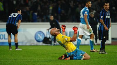 Napoli goalkeeper Pepe Reina celebrates his team’s victory over Inter Milan on Monday. The Spaniard has drawn ‘exceptional’ praise from teammates this season. Ciro Fusco / EPA