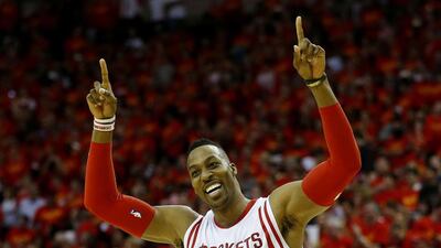 HDwight Howard #12 of the Houston Rockets celebrates after they defeated the Los Angeles Clippers 113 to 100s. Scott Halleran / Getty Images