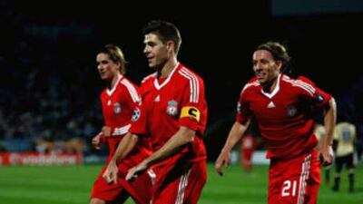 Steven Gerrard of Liverpool celebrates scoring his second goal from the penalty spot.