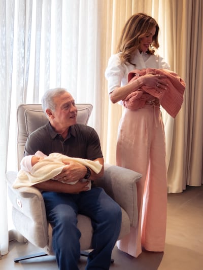 King Abdullah II and Queen Rania with Princess Iman's twin girls Talia and Rania. Queen Rania / Instagram