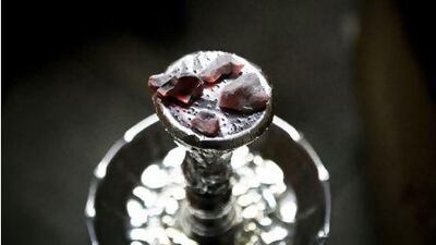 Chillax Lounge, located in between Zayed the 1st and the Corniche near 32nd st is a popular place to take a break or relax after work. Seen here are coals that warm up the tobacco this lounge is so well known for.