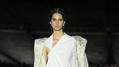 A model walks the runway during the Dior Cruise show 2022 at Panathenaic Stadium on June 17, 2021 in Athens, Greece. Getty Images