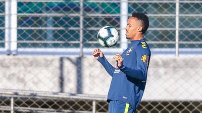 Brazil defender Eder Militao chests the ball during a training session. Getty Images