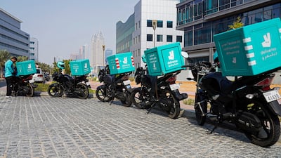 Its delivery drivers are a familiar sight outside its cloud kitchens. Jon Gambrell / AP Photo