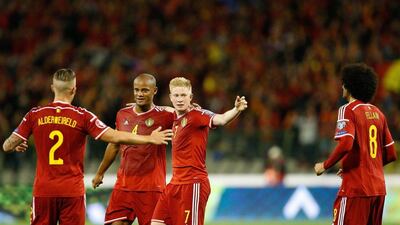 Kevin De Bruyne, right, has moved from Wolfsburg to Manchester City for €75m, a record transfer involving a German club. Laurent Dubrule / EPA
