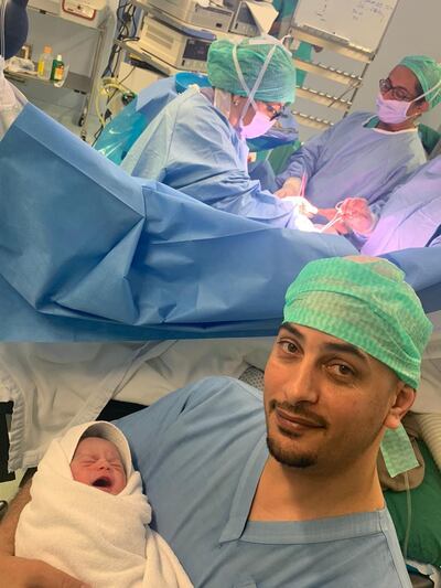Khadijeh Cheragheleh cradles his son, Diyab, born shortly after midnight on the 48th UAE National Day. Courtesy Al Zahra Hospital