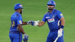 UAE captain Muhammad Waseem, right, during the ILT20 earlier this year at the Dubai International Stadium. Chris Whiteoak / The National