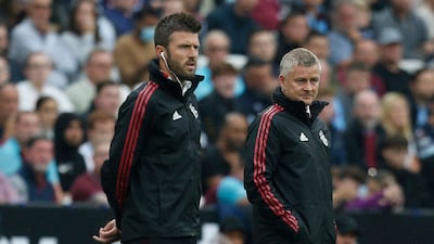 Michael Carrick, left, was assistant manager to Ole Gunnar Solskjaer, right, and has now been given the top job until Manchester United appoint their next manager. AFP