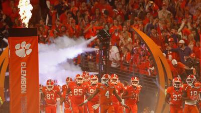 Deshaun Watson #4 of the Clemson Tigers takes the field with his teammates prior to the 2016 College Football Playoff National Championship Game against the Alabama Crimson Tide at University of Phoenix Stadium on January 11, 2016 in Glendale, Arizona. Kevin C. Cox/Getty Images/AFP