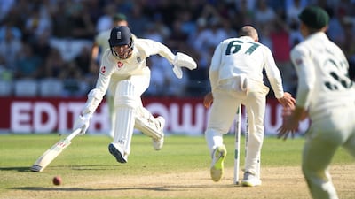 Jack Leach evades being run out as Nathan Lyon fumbles the ball. Getty Images
