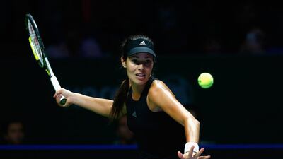 Ana Ivanovic of Serbia readies to play a shot during her win over Eugenie Bouchard at the WTA Finals on Wednesday in Singapore. Julian Finney / Getty Images / October 22, 2014