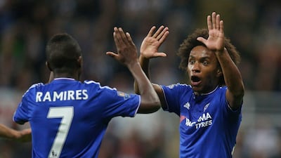 Ramires, left, and Willian, came off the bench to lead Chelsea's fightback and salvage a draw at Newcastle. Russell Cheyne / Reuters