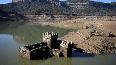 A partially submerged at the low water-level reservoir of Sau in Vilanova de Sau in Catalonia. AFP