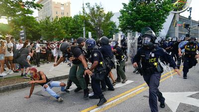 Police detain protesters in Atlanta, Georgia. Getty Images