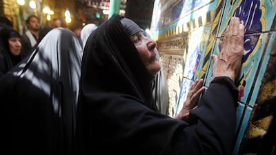 Iraqi women pray at the shrine of Imam Abbas bin Ali ibn Abi Taleb, one of Shiite Islam's most revered figures, during the Shaabaniya ceremony commemorating the birth of Imam al-Mahdi, the 12th holiest figure for Shiite Muslims, in the city of Karbala, on???