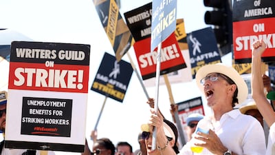 Sag-Aftra actors and Writers Guild of America writers on a picket line outside Paramount Studios in Los Angeles, California. Reuters