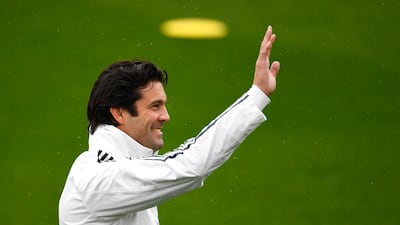 Temporary Real Madrid first-team manager Santiago Solari waves during a training session at the Ciudad Real Madrid training facilities as he prepares his team to take on Melilla in the Copa del Reyon Wednesday. AFP