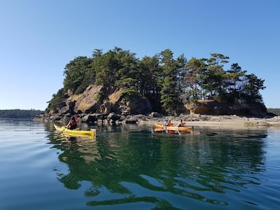 Kayaking in the San Juans, Washington State, USA.