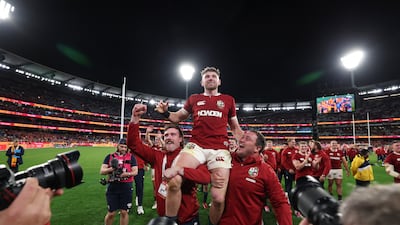 Hugo Keenan is held aloft after his match-winning try in Melbourne that gave the Lions a 2-0 lead in a three-Test series. Getty Images