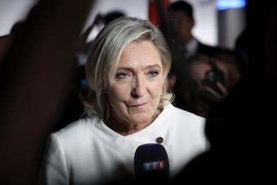 Marine Le Pen addresses journalists at the party's headquarters in the hours before her party's defeat became clear. EPA