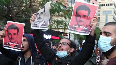 Students from different universities carry placards, wave Lebanese flags during a demonstration under the slogan of 'A Day of Student Rage' in Al-Hamra, Beirut. EPA