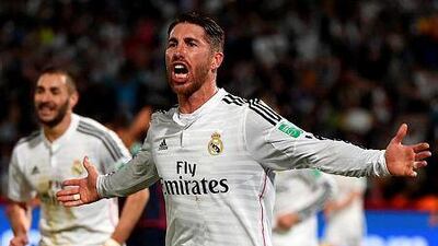 Real Madrid's defender Sergio Ramos celebrates after scoring a goal against San Lorenzo during the Fifa Club World Cup final football match at the Marrakesh stadium in the Moroccan city of Marrakesh on December 20, 2014. AFP PHOTO / FADEL SENNA