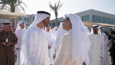 Sheikh Mohammed bin Zayed, Crown Prince of Abu Dhabi and Deputy Supreme Commander of the UAE Armed Forces (L), bids farewell to Mohammed Alabbar, Founder and Chairman of Emaar Properties and Board Member of Eagle Hills (R), after a visit to the Expo 2020 main office in Jebel Ali. Omar Al Askar for The Crown Prince Court - Abu Dhabi