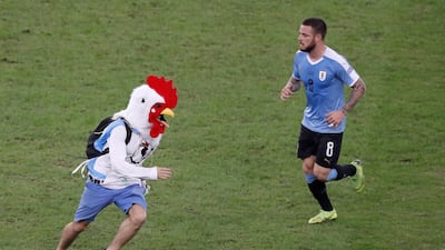 A pitch invader runs on the field during the Copa America 2019 Group Cmatch between Chile and Uruguay, at the Maracana Stadium in Rio de Janeiro. EPA