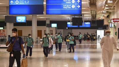 Members of an Indian medical team arrive at Dubai International Airport to help with the coronavirus (COVID-19) pandemic. AFP