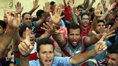 Kashmiri Pandit migrants shout slogans against state government during protests at the migrant relief commissioner office in Jammu, the winter capital of Kashmir, India on July 20, 2016. Jaipal Singh/EPA