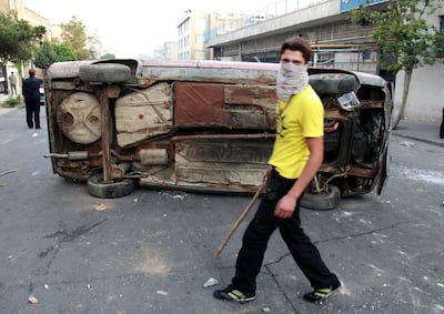 A supporter of Iran's defeated presidential candidate Mir Hossein Mousavi during clashes with Iranian police in Tehran on June 19, 2009. AFP