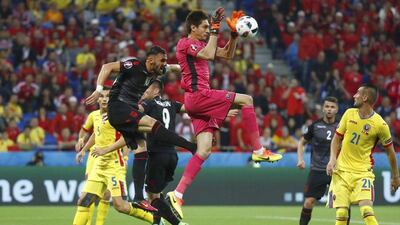 Romania goalkeeper Ciprian Tatarusanu makes a save. Kai Pfaffenbach / Reuters