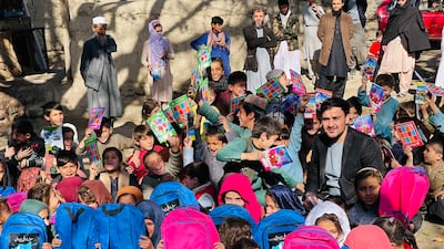 Pen Path volunteers with school children in Afghanistan.