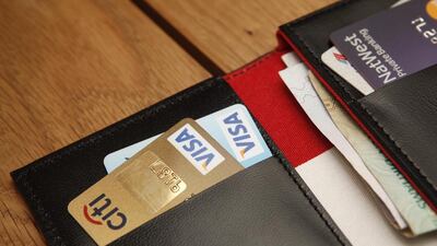 Credit card debts need to be paid before departure from the UAE. Antonie Robertson / The National