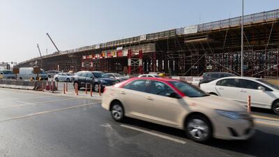 Major works to boost capacity on Airport Road have been ongoing since last year, as this picture from July 2017 shows. Duncan Chard for The National